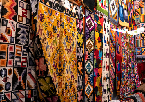 Colorful Peruvian artisanal textiles cloth with inca and traditional patterns at street Andean market in Pisac, sacred valley, Peru. © MyriamB