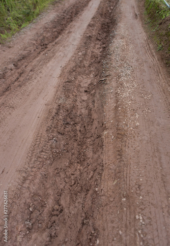 Wheel tracks on the dirt ground