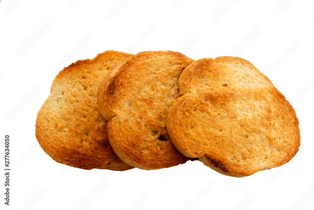 Round pieces of toasted sandwich bread on a white background. Isolated. Close-up. Round pieces of toasted sandwich bread on a white background. Isolated. Close-up.