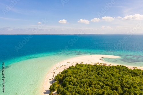 Fototapeta Naklejka Na Ścianę i Meble -  Large tropical island white sandy beach, view from above. Seascape, nature of the Philippine Islands. Tropical forest and sea lagoons.