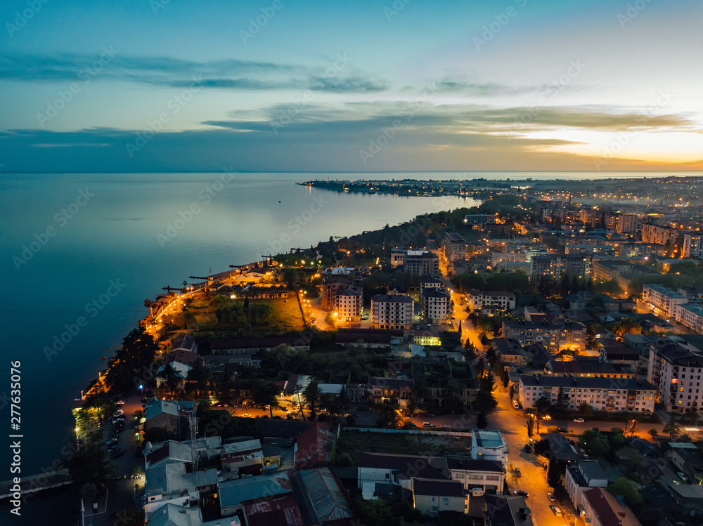 Evening resort town Sukhum, Abkhazia aerial view from drone