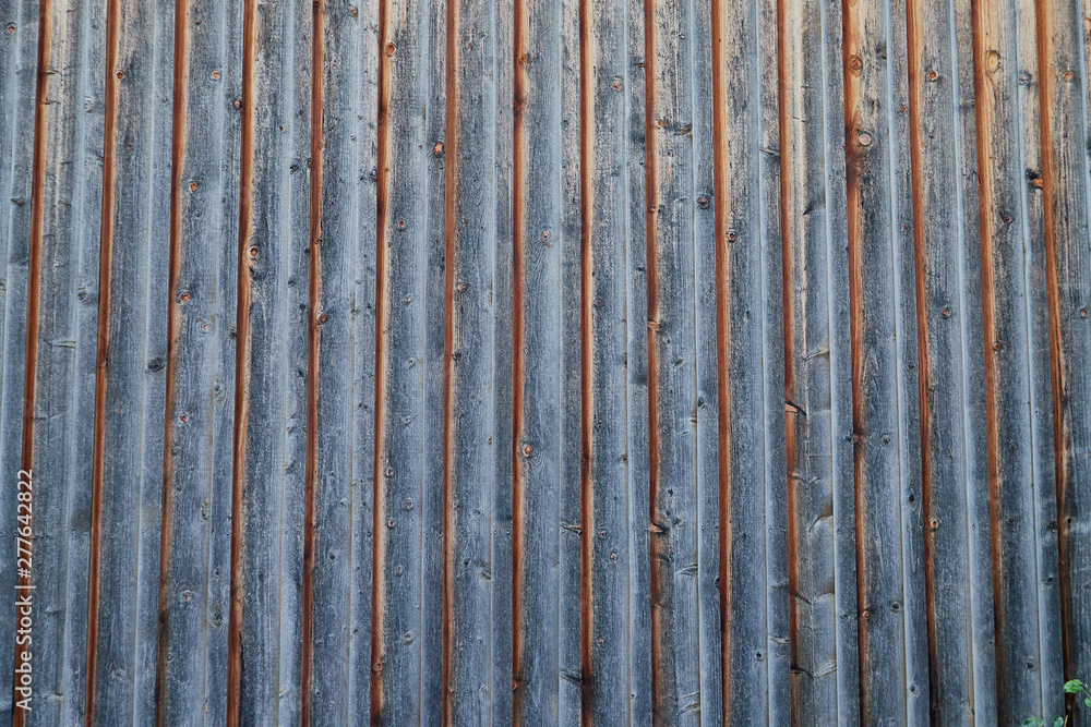 Pine logs. Log wall Texture of natural pine logs. Grey and brown natural wood background Pine logs. Log wall Texture of natural pine logs. Grey and brown natural wood background