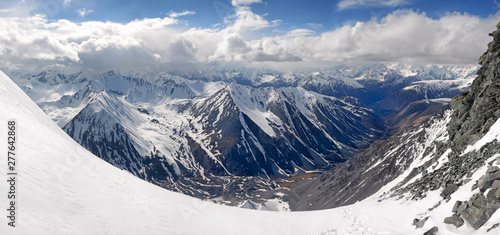 Mountainous landscape. Beautiful panorama of South Chuya Mountain Range from slope of Metallurg Peak. Altai Republic, Siberia, Russia. photo