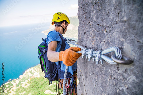 Man climbing mountain. 