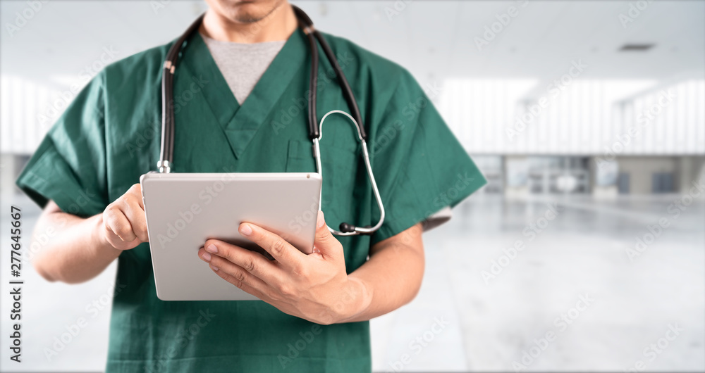 young doctor with hospital background young doctor with hospital background
