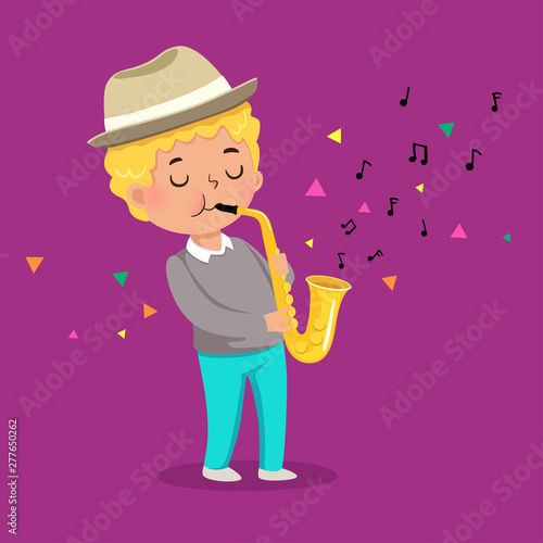Cute boy playing saxophone on purple background