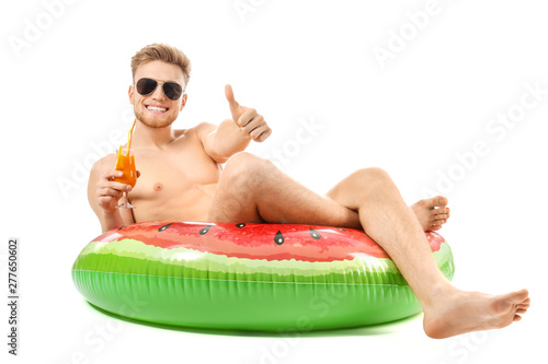 Young tourist with inflatab...