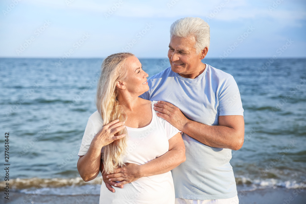 Happy mature couple at sea resort Happy mature couple at sea resort