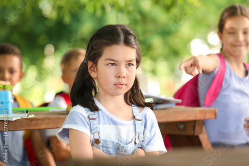 Bullied little girl with sc...