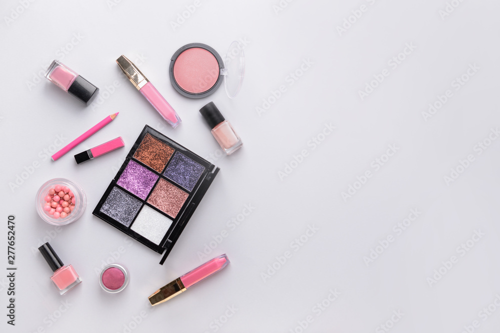 Set of decorative cosmetics on light background Set of decorative cosmetics on light background