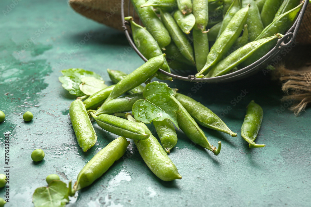 Tasty fresh peas on color background Tasty fresh peas on color background