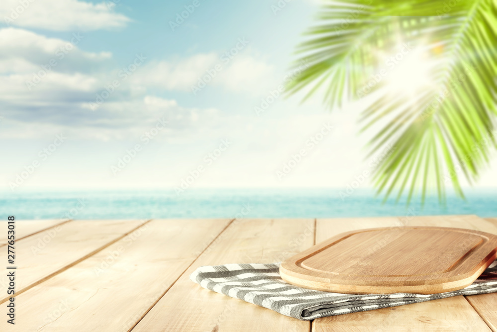 Desk of free space and summer beach landscape 