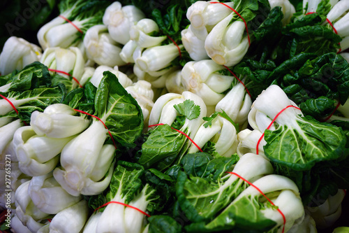 Bunches of green bok choi cabbages at an Asian market