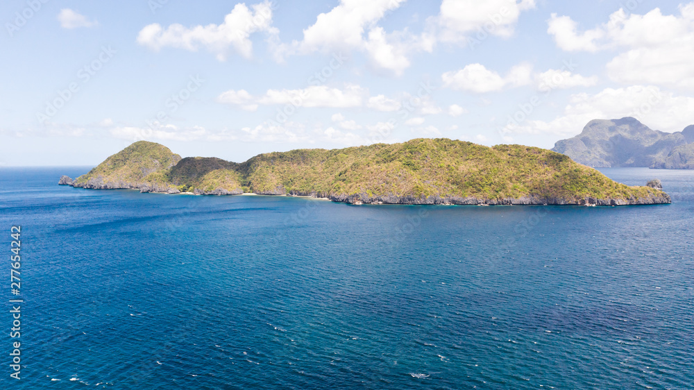 Seascape with islands. Blue sea and large islands. Big island with woodland. Philippines, Seascape with islands. Blue sea and large islands. Big island with woodland. Philippines,