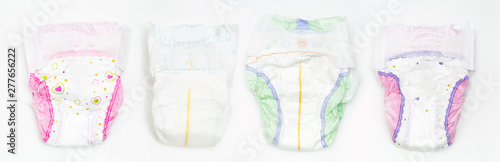 Photographie Set of Disposable Baby Diapers Over White Background