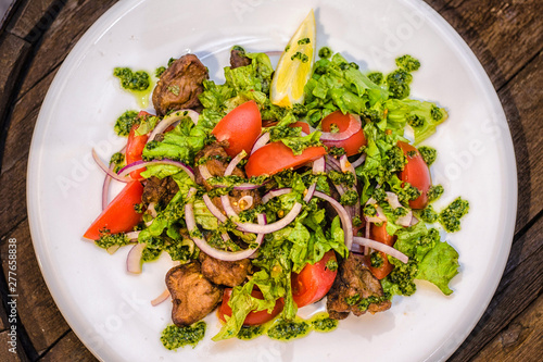 Shish kebab with vegetable salad