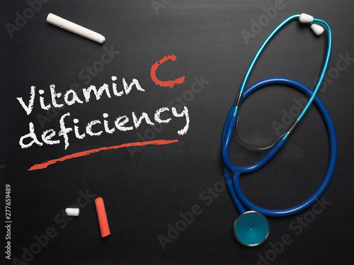 The words Vitamin C deficiency on a chalkboard