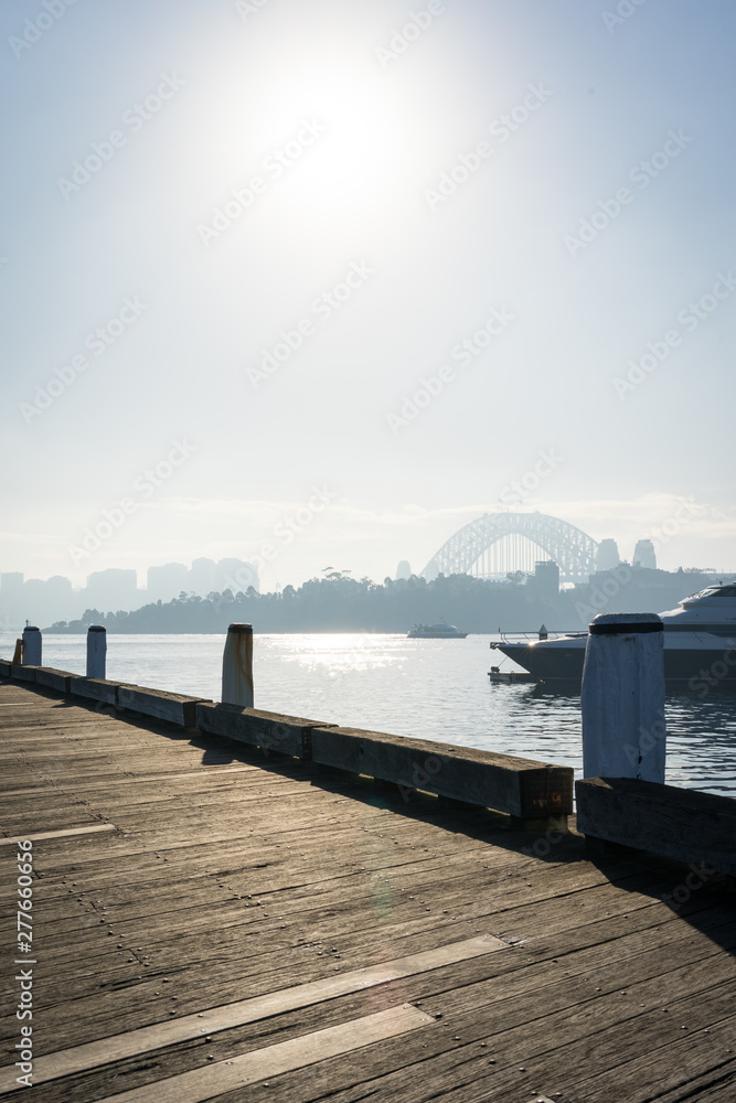 Early morning sun haze over the water at Pirrama Park/Jones Bay Wharf, Sydney NSW. June 2019