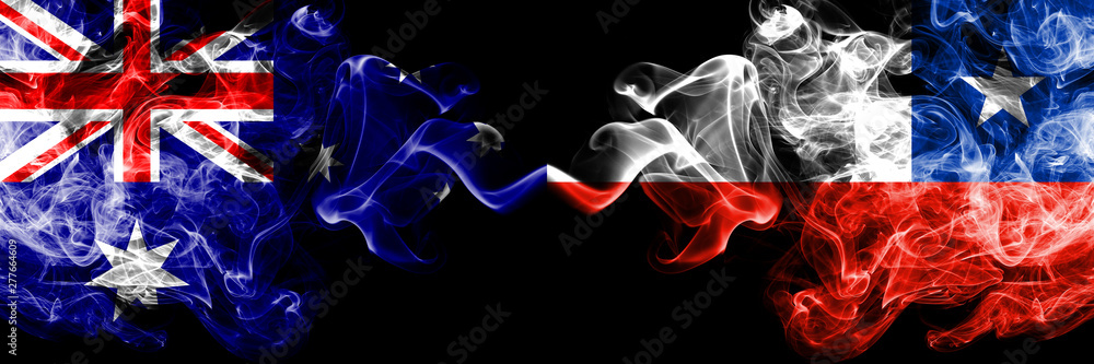 Fototapeta premium Australia vs Chile, Chilean smoky mystic flags placed side by side. Thick colored silky smokes combination of national flags of Australia and Chile, Chilean