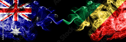 Australia vs Congo, Congolese smoky mystic flags placed side by side. Thick colored silky smokes combination of national flags of Australia and Congo, Congolese