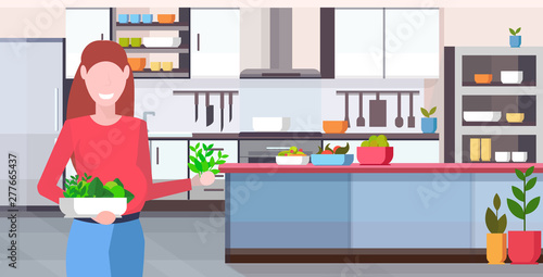 pregnant woman holding fresh fruits and vegetables healthy nutrition pregnancy motherhood concept modern kitchen interior flat portrait horizontal