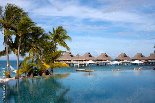 The pool under palm trees on the seashore.Polynesia, Tahiti