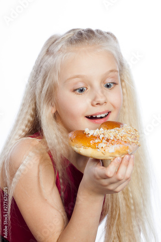 Girl looking at croissant
