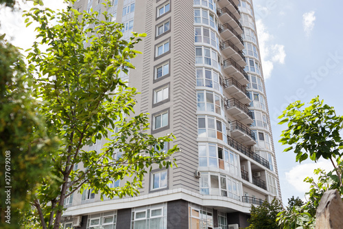 Modern apartment buildings on a sunny day. Facade of a modern apartment building