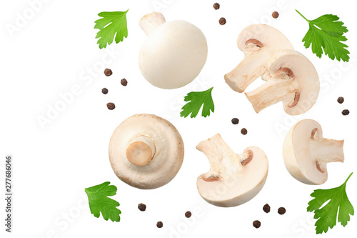 mushrooms with slices, parsley leaf and peppercorns isolated on white background. top view
