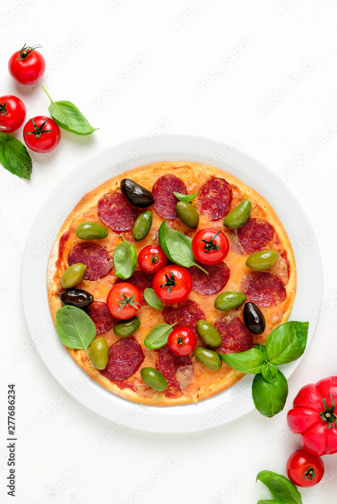 Pizza with salami and olives, top down view Pizza with salami and olives, top down view