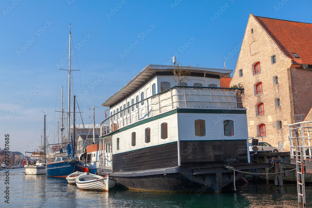 water canal with boats in Copenhagen water canal with boats in Copenhagen