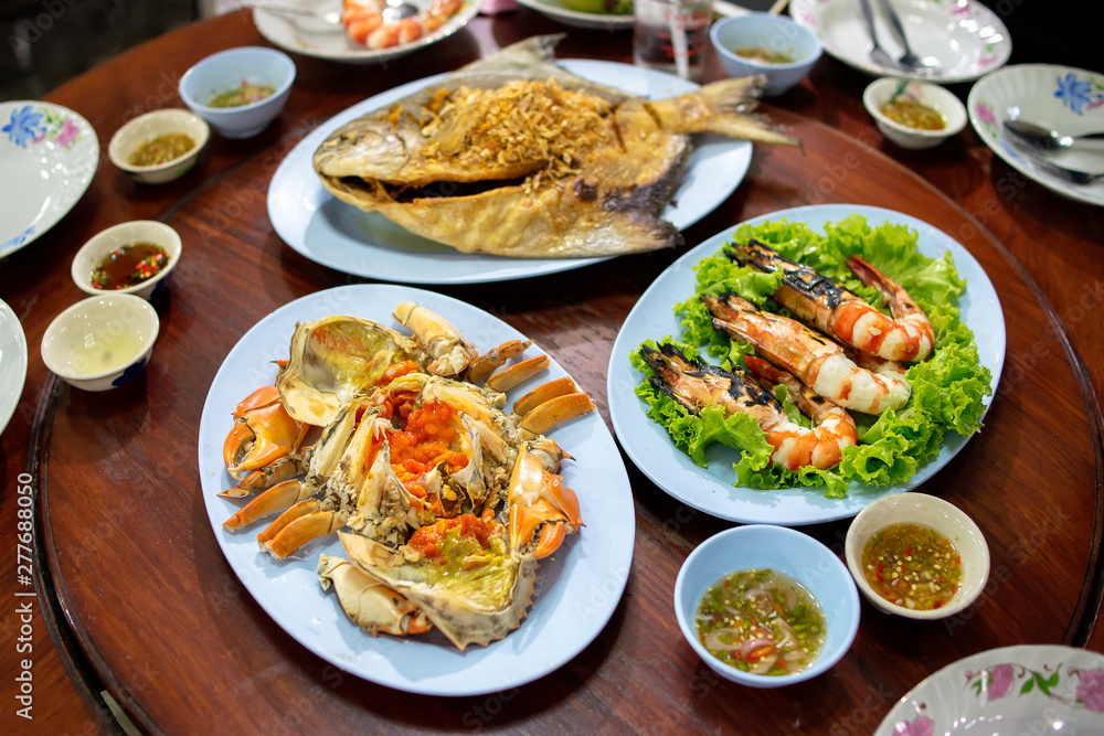 Various of seafood on the wooden table Various of seafood on the wooden table