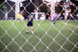 Abstract of soccer net behind the soccer game