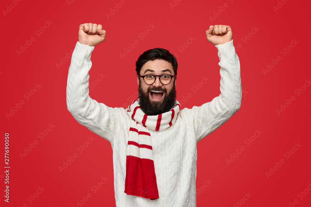 Fototapeta premium Bearded male celebrating victory