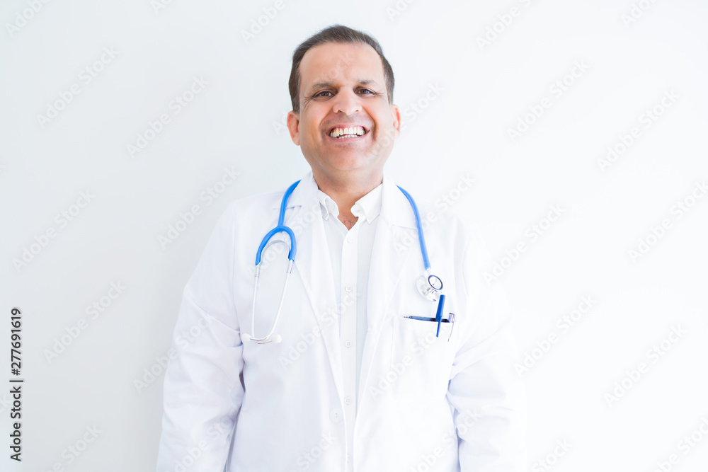 Middle age doctor man wearing stethoscope and medical coat over white background with a happy and cool smile on face. Lucky person. Middle age doctor man wearing stethoscope and medical coat over white background with a happy and cool smile on face. Lucky person.