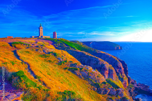 france,brittany,frehel : lighthouse and cliff