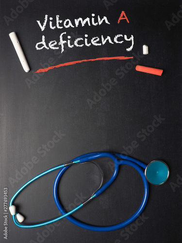 The words Vitamin A deficiency on a chalkboard