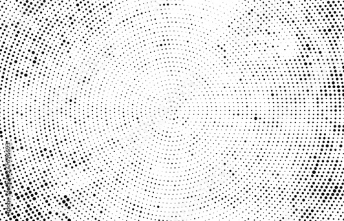 Abstract radial halftone texture. Monochrome background of black dots on white.