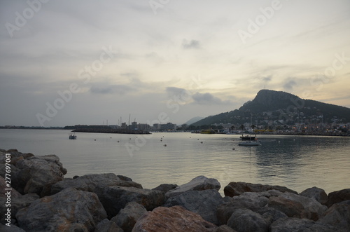 sunset on coast of sea