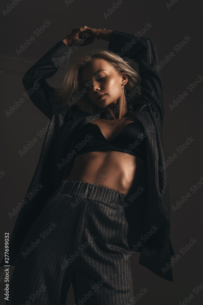 Sexy Barely Legal Black Girls - Sexy hot woman in lingerie and suit posing in studio on black background.  Seductive nude glamour young girl model portrait. Underwear passion. Stock  Photo | Adobe Stock