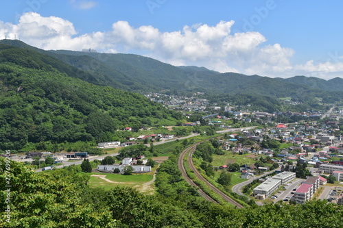 Landscape with mountain and town in Hokkaido, Japan © Yujun