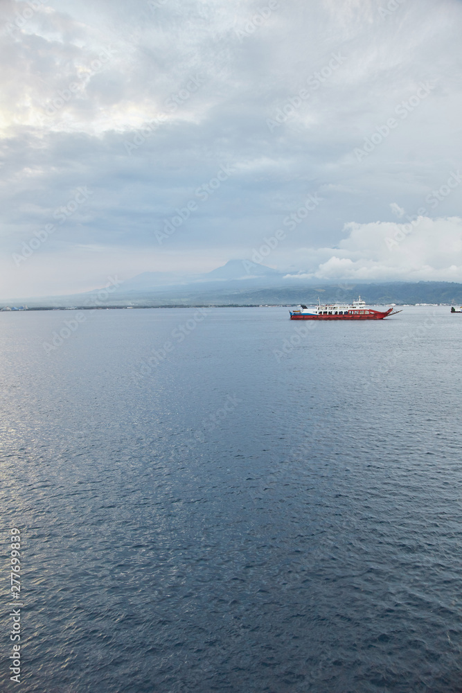 ship in bali strait. Between the islands of Bali and Java