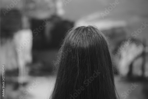 Photo of the back of the head with long hair made in gallery and right form the back.