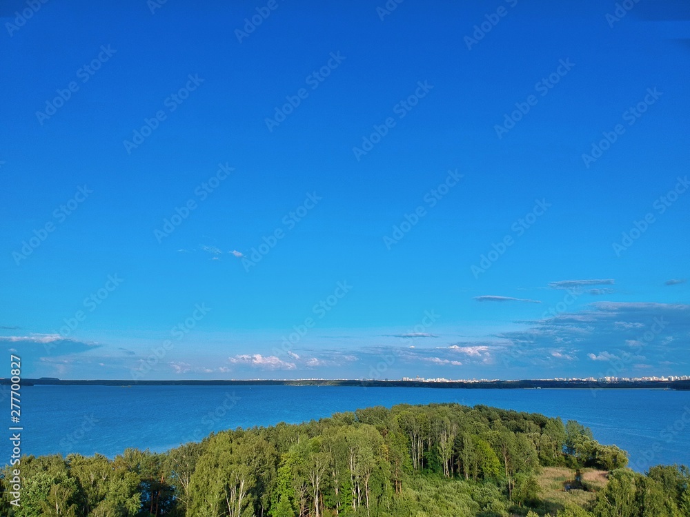 Aerial view of the lake and islands near Yunost sanatorium in Honoles, Minsk Region of Belarus Aerial view of the lake and islands near Yunost sanatorium in Honoles, Minsk Region of Belarus