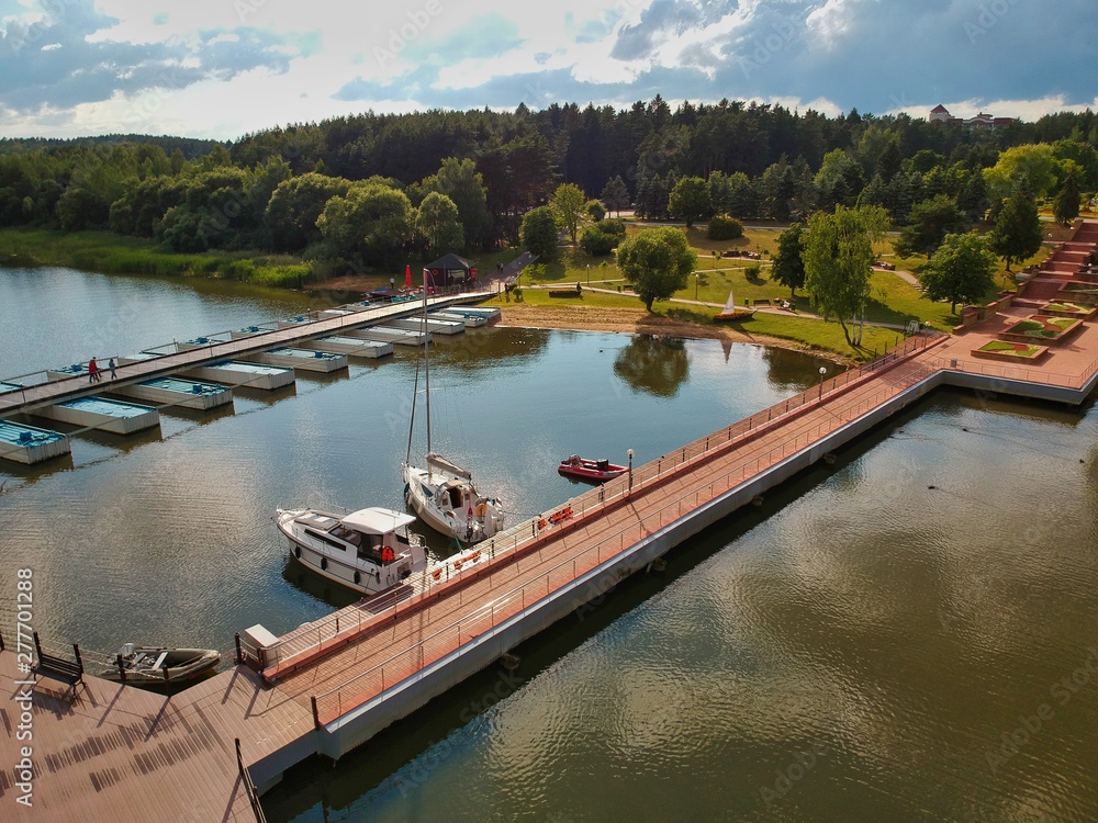 Naklejka premium Pier and boats on Minsk sea in Belarus