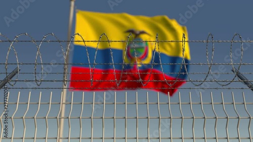 Flying flag of Ecuador behind barbed wire fence. Conceptual loopable 3D animation photo