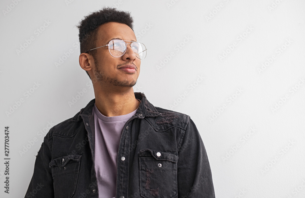 Fototapeta premium Black guy looking away near empty space