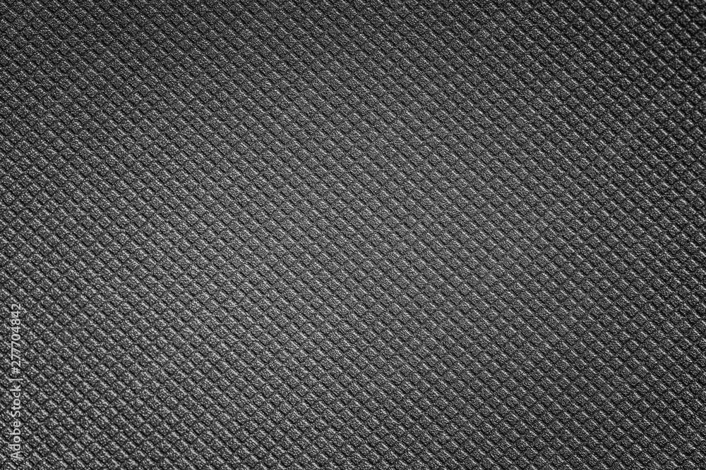 Close up of black textured plastic background Close up of black textured plastic background