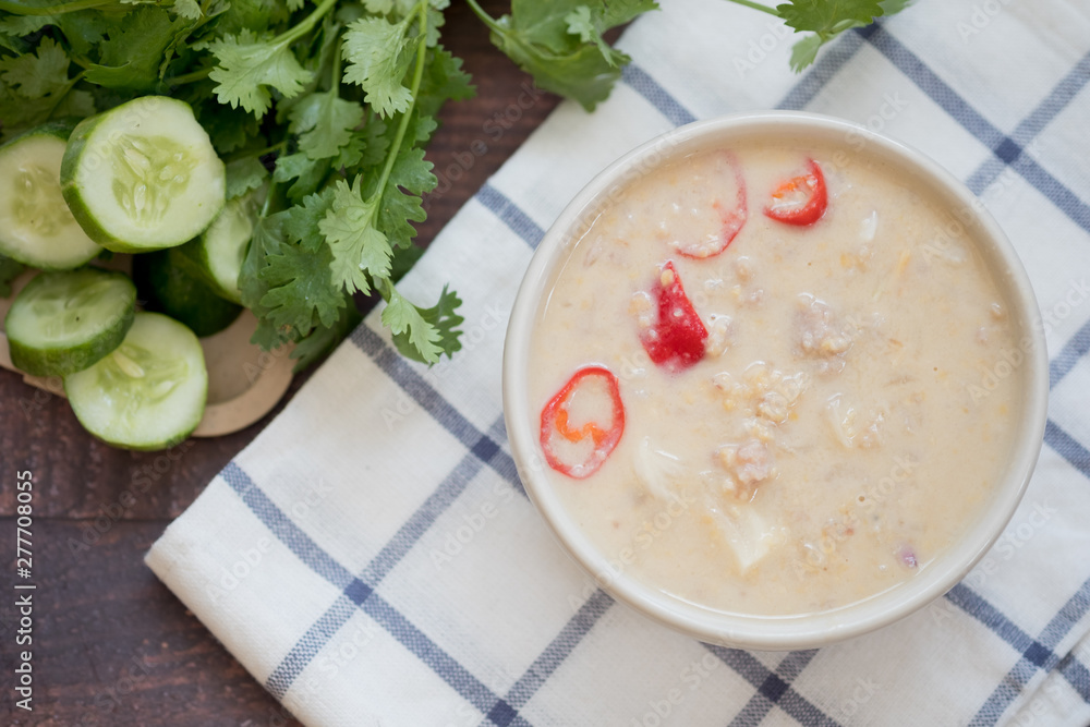 Tao Jiaw Lone (Herbed soya beans with minced pork in coconut milk) Tao Jiaw Lone (Herbed soya beans with minced pork in coconut milk)