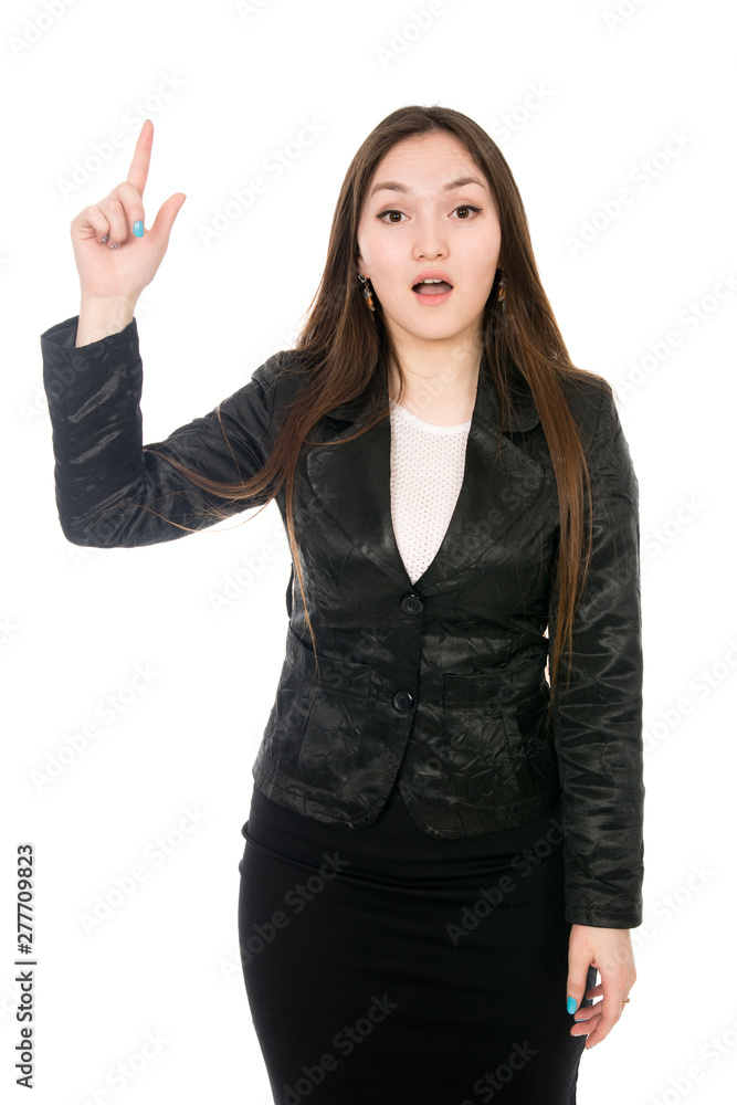 Portrait of a surprised business woman pointing fingers up isolated over a white background. Portrait of a surprised business woman pointing fingers up isolated over a white background.